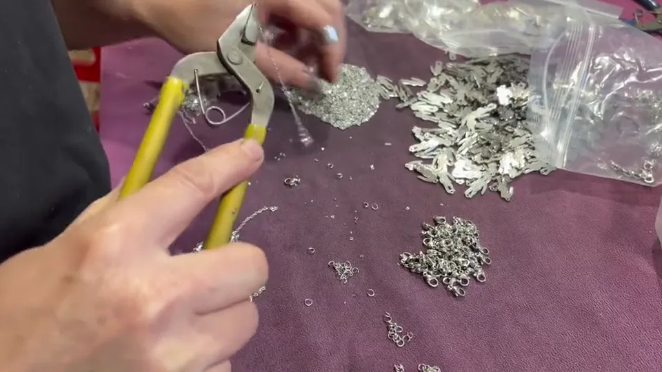 Manual jewelry component assembly at the Jinming factory